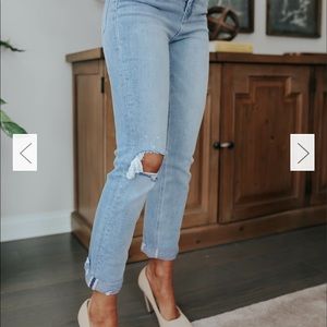 CAREFREE DISTRESSED LIGHT WASH STRAIGHT JEANS